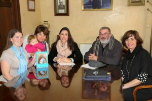 become an author presenting my self-published book to the local mayor at the Town Hall in Spain